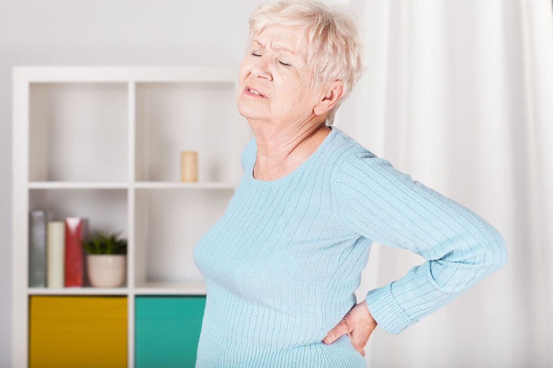Lower back pain in a woman may cause osteochondrosis
