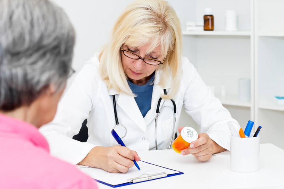 Doctor prescribing medicines for hip joint pain